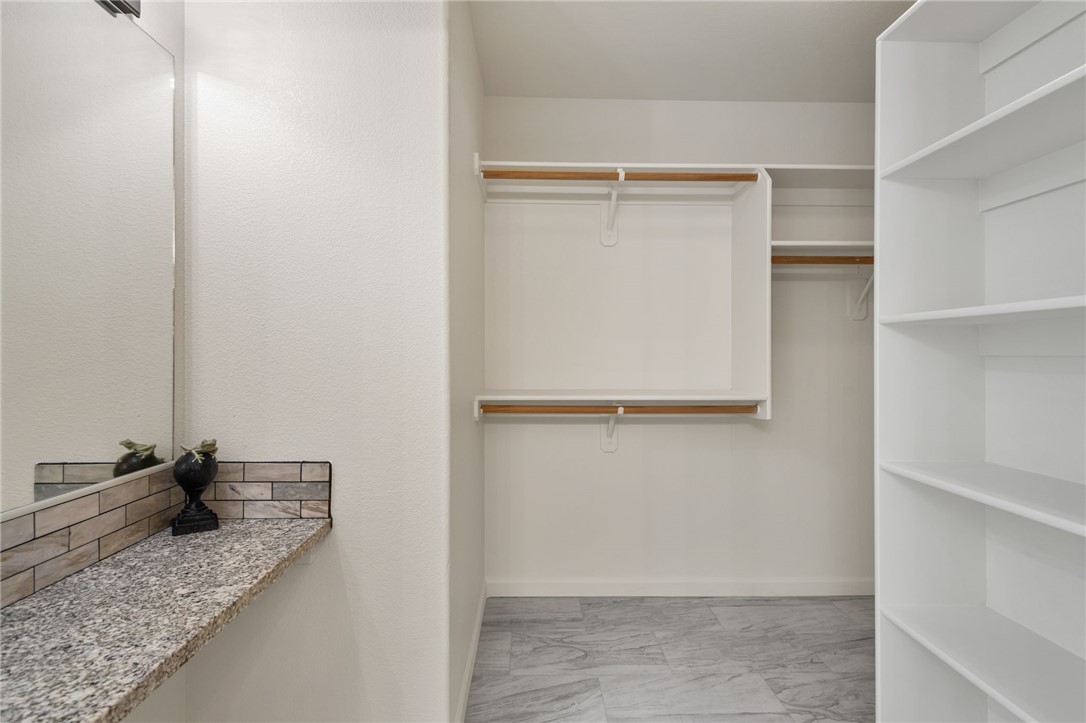 3731 Bagdad Road Golden Valley, AZ 86413 - Photo 24 of 39 Primary walk-in closet with vanity