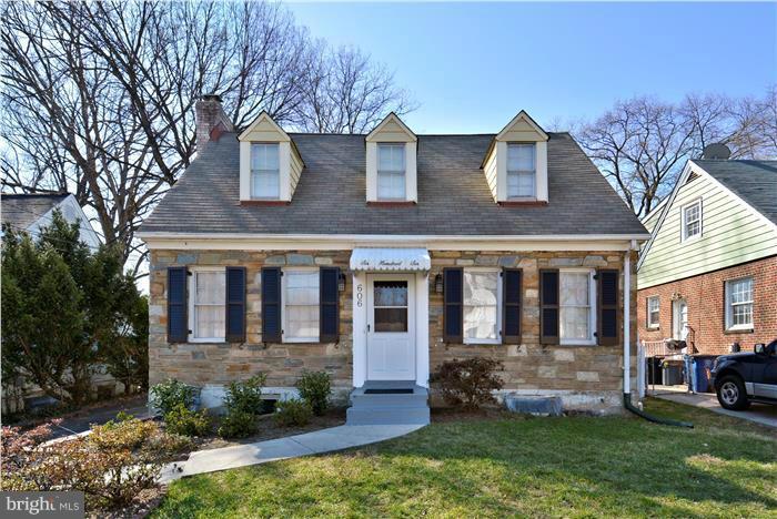 606 Forest Glen Road Silver Spring, MD 20901 - Photo 1 of 25 a front view of a house with a yard
