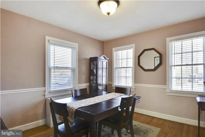 606 Forest Glen Road Silver Spring, MD 20901 - Photo 9 of 25 a view of a dining room with furniture window and outside view