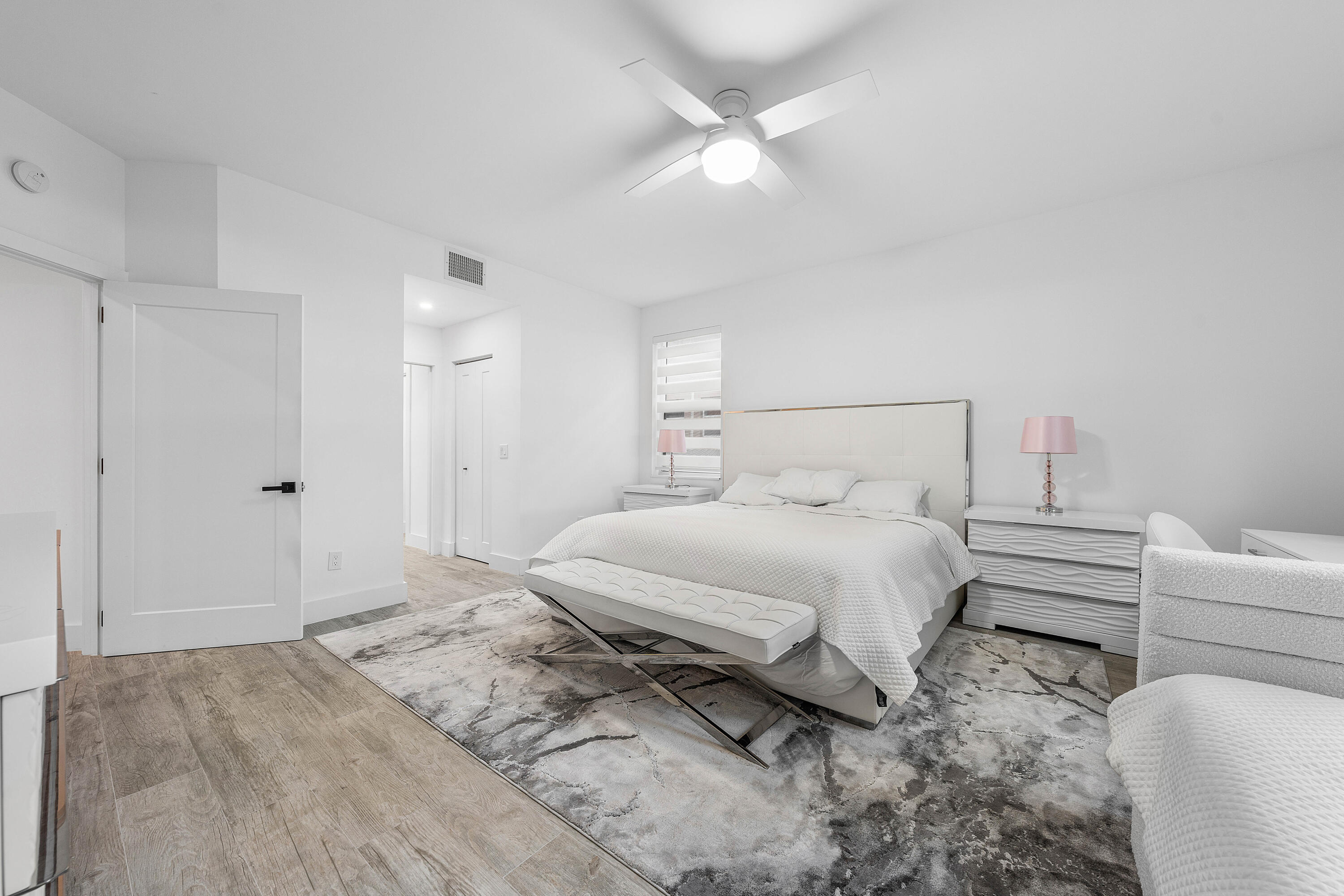 6229 Graycliff Drive, Unit A Boca Raton, FL 33496 - Photo 13 of 33 a bedroom with a bed and a dresser