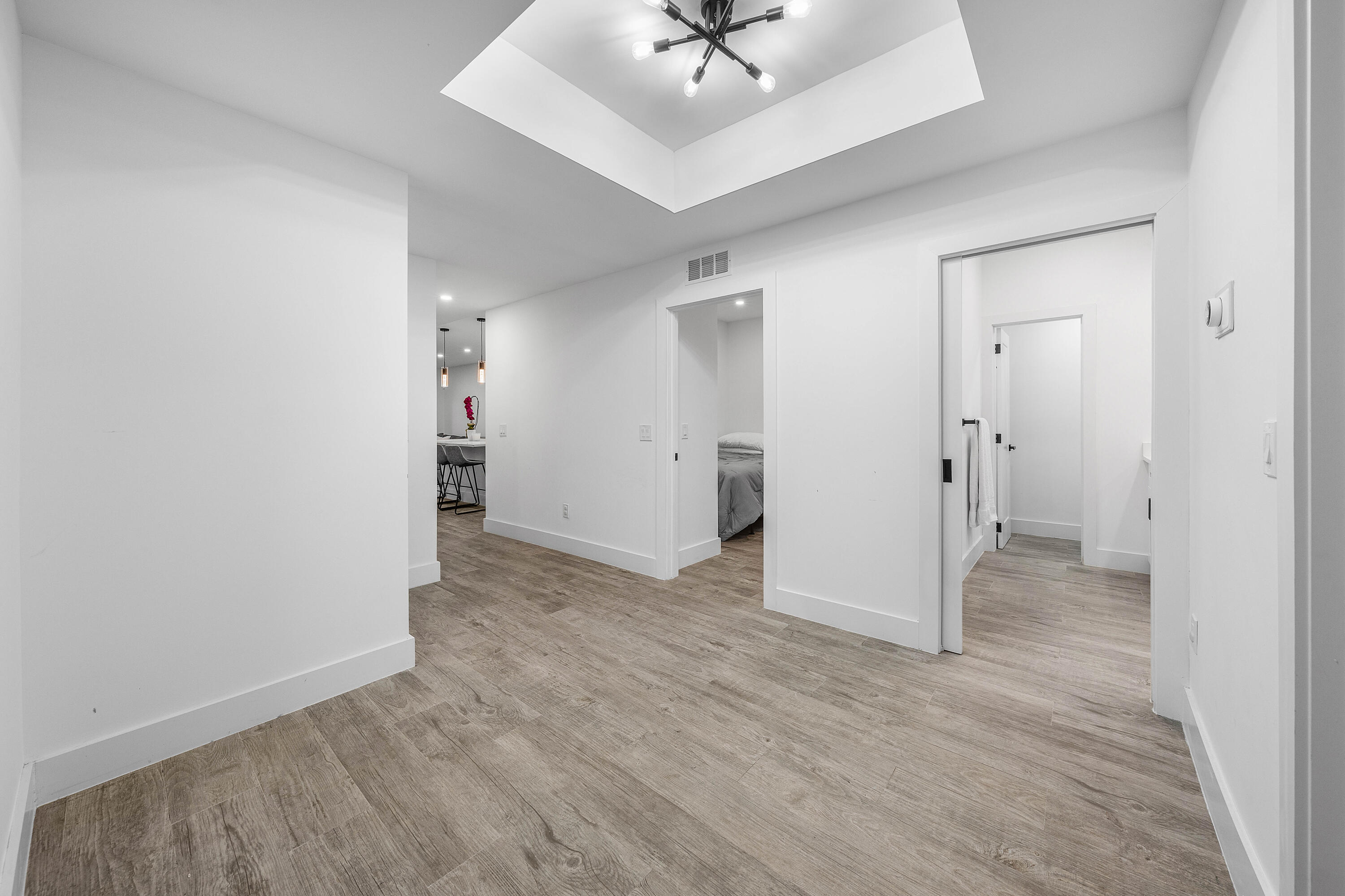 6229 Graycliff Drive, Unit A Boca Raton, FL 33496 - Photo 2 of 33 wooden floor in an empty room
