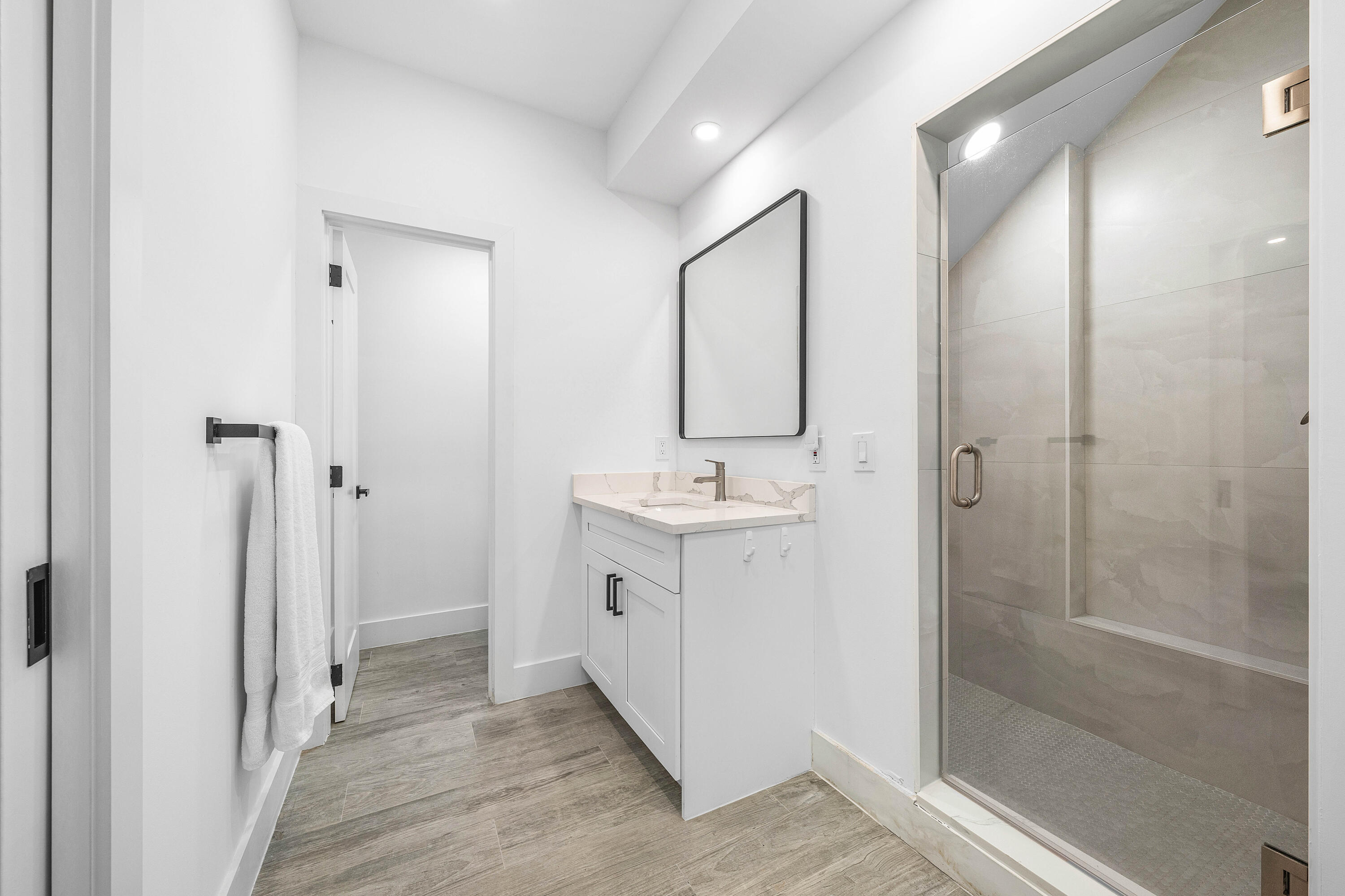 6229 Graycliff Drive, Unit A Boca Raton, FL 33496 - Photo 23 of 33 a bathroom with a sink and mirror