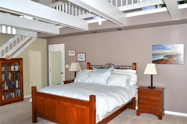 370 North Emerson Road Lexington, MA 02420 - Photo 15 of 30 a bedroom with a bed and a lamp on the dresser