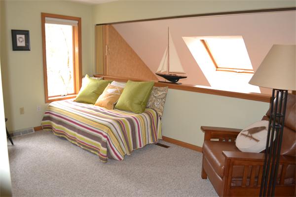 370 North Emerson Road Lexington, MA 02420 - Photo 22 of 30 a bedroom with a bed a lamp and a window