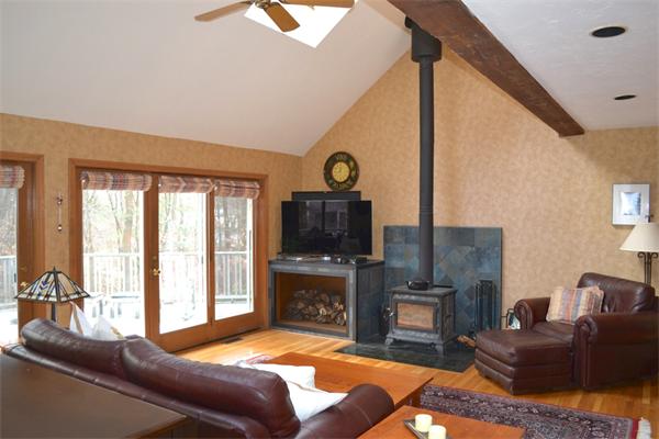 370 North Emerson Road Lexington, MA 02420 - Photo 8 of 30 a living room with furniture and a fireplace