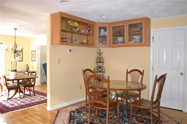 370 North Emerson Road Lexington, MA 02420 - Photo 9 of 30 a view of a dining room with furniture and chandelier