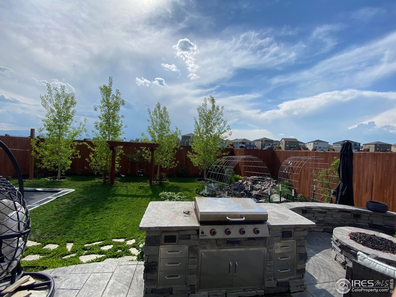 4403 Garnet Way Longmont, CO 80504 - Photo 12 of 20 Stamped concrete patio, grill and luxury features