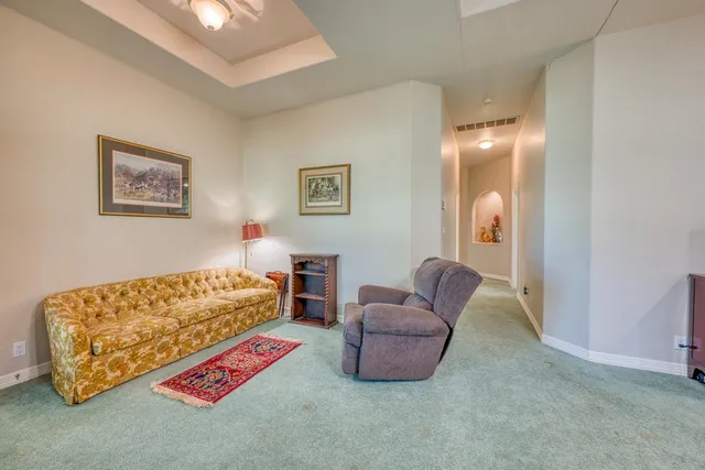 a bedroom with furniture and a bed