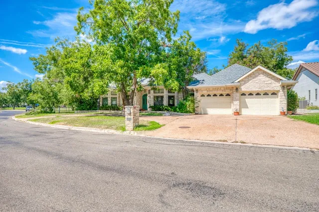 a view of a house with a swimming pool