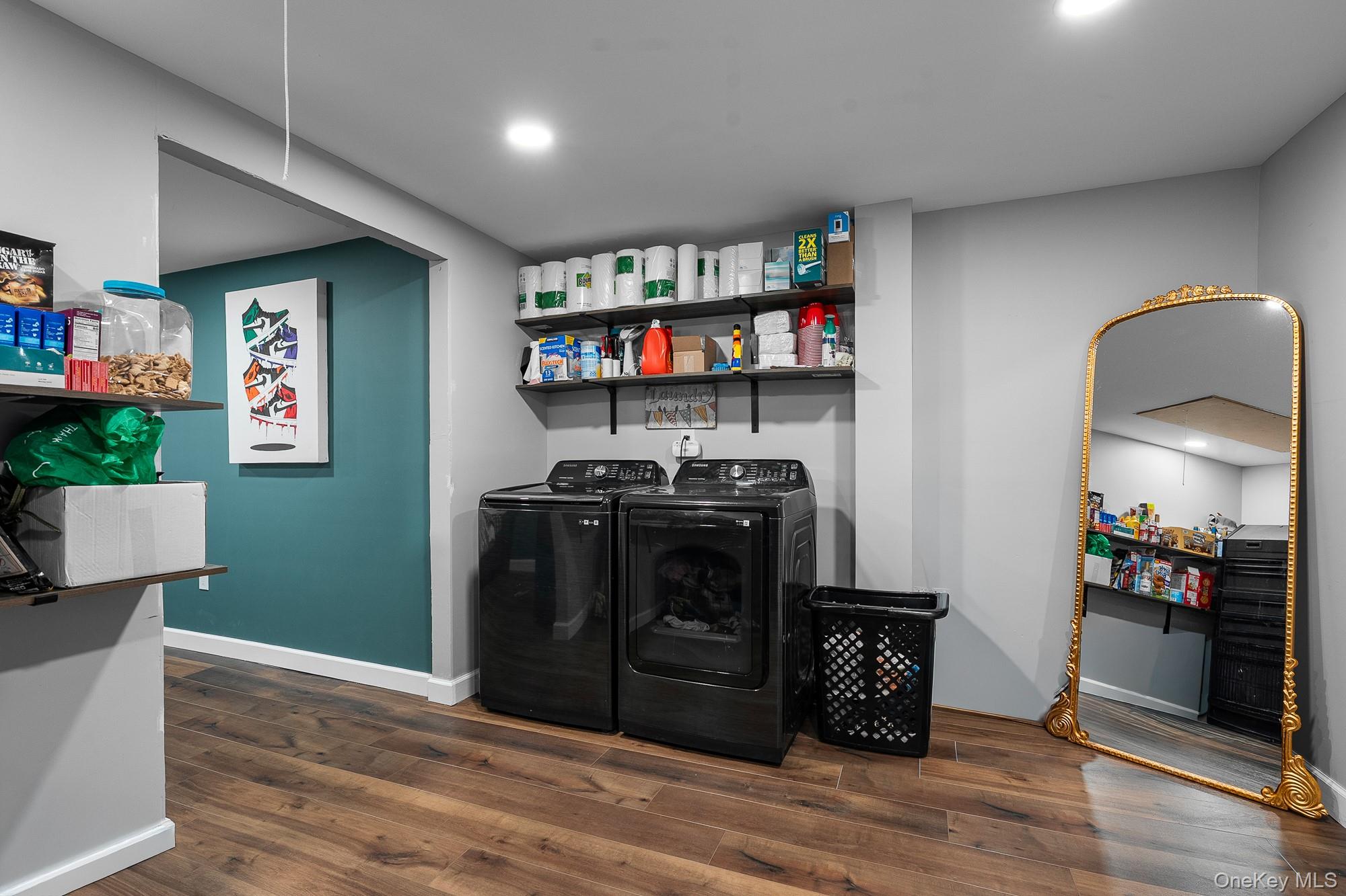19 Corvette Road Selden, NY 11784 - Photo 12 of 28 Laundry area with dark wood-style floors, washing machine and clothes dryer, and recessed lighting