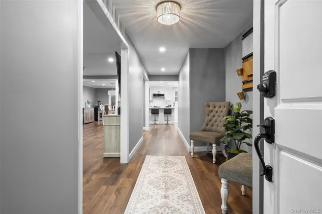 a view of livingroom with furniture and entryway