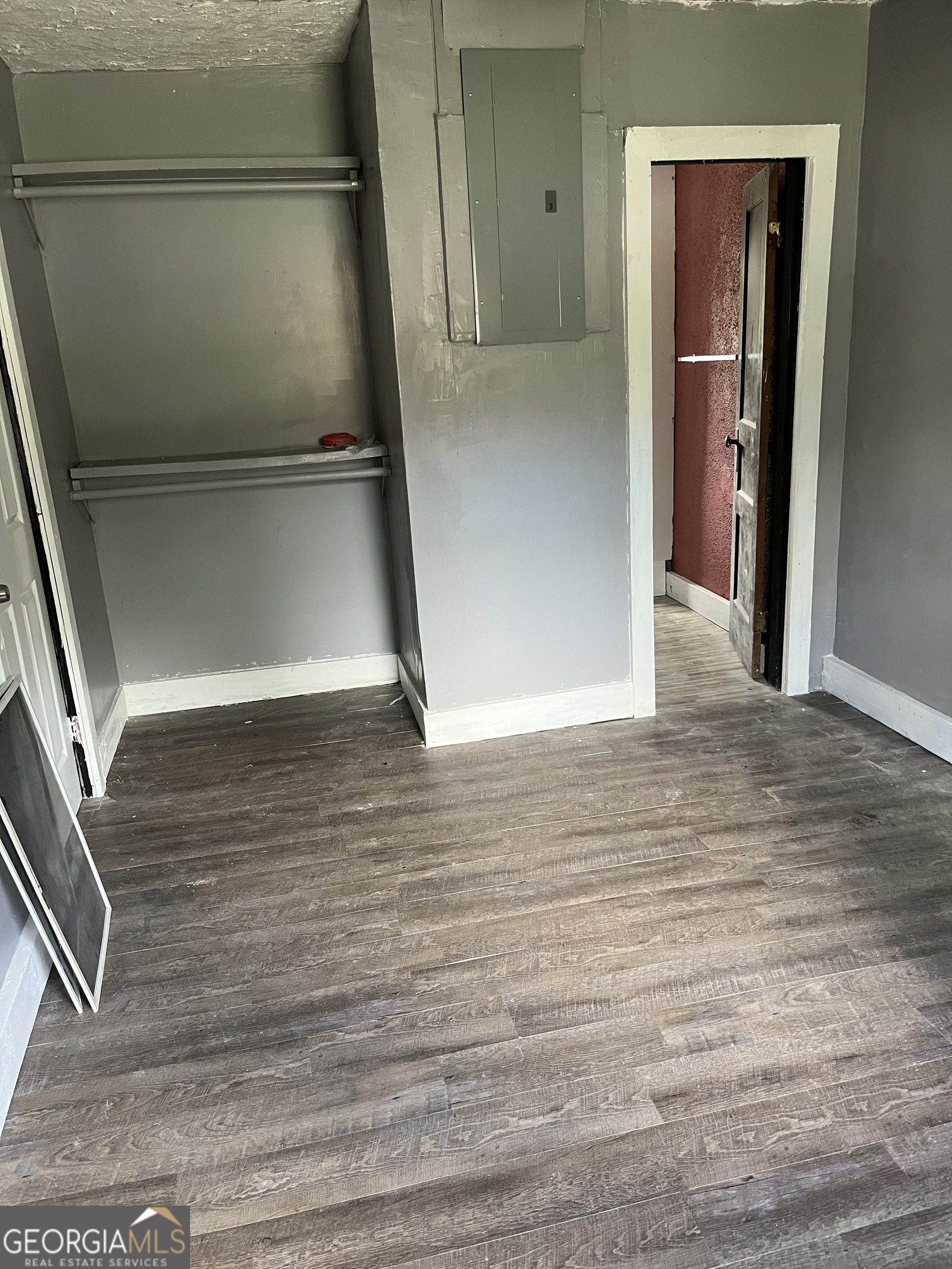 3412 Antioch Road Macon, GA 31206 - Photo 2 of 3 a view of a hallway with wooden floor