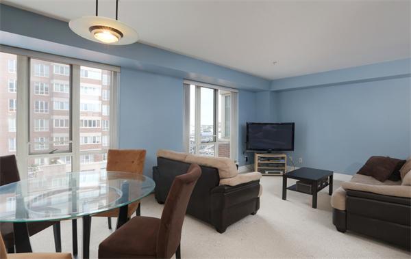 197 8th Street, Unit 501 Boston, MA 02129 - Photo 4 of 9 a view of a livingroom with furniture and a window