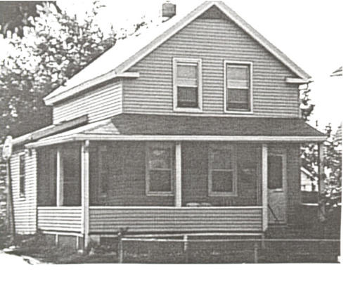 893 Liberty Street Springfield, MA 01104 - Photo 1 of 1 a view of a house and a window