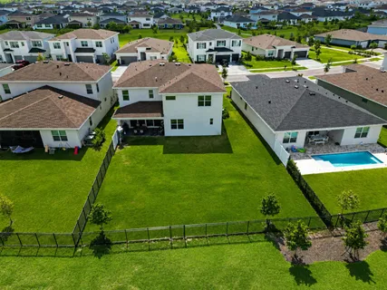 a view of swimming pool with a yard
