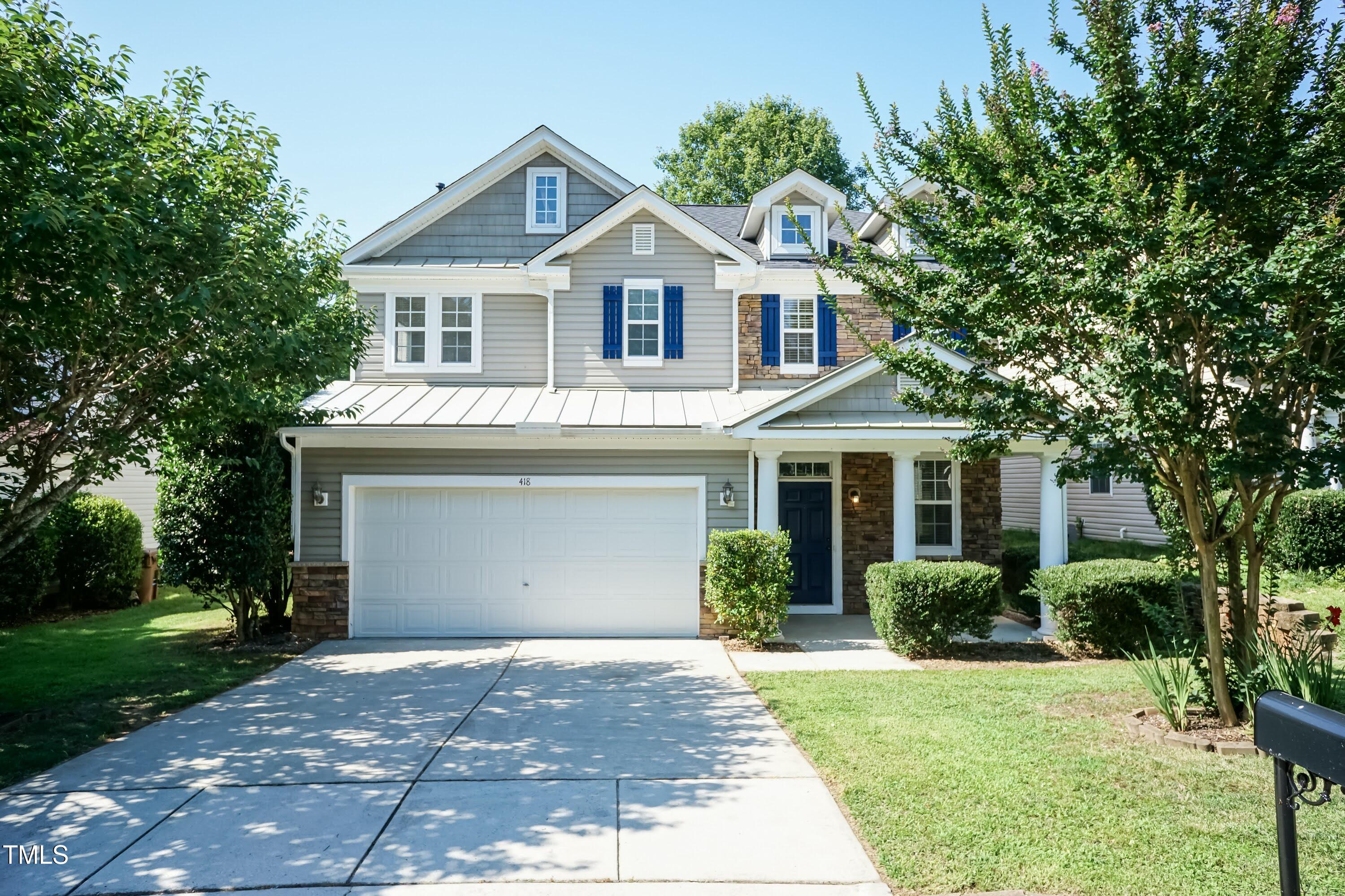 418 Byrams Ford Drive Cary, NC 27513 - Photo 1 of 53 a view of a yard in front of house