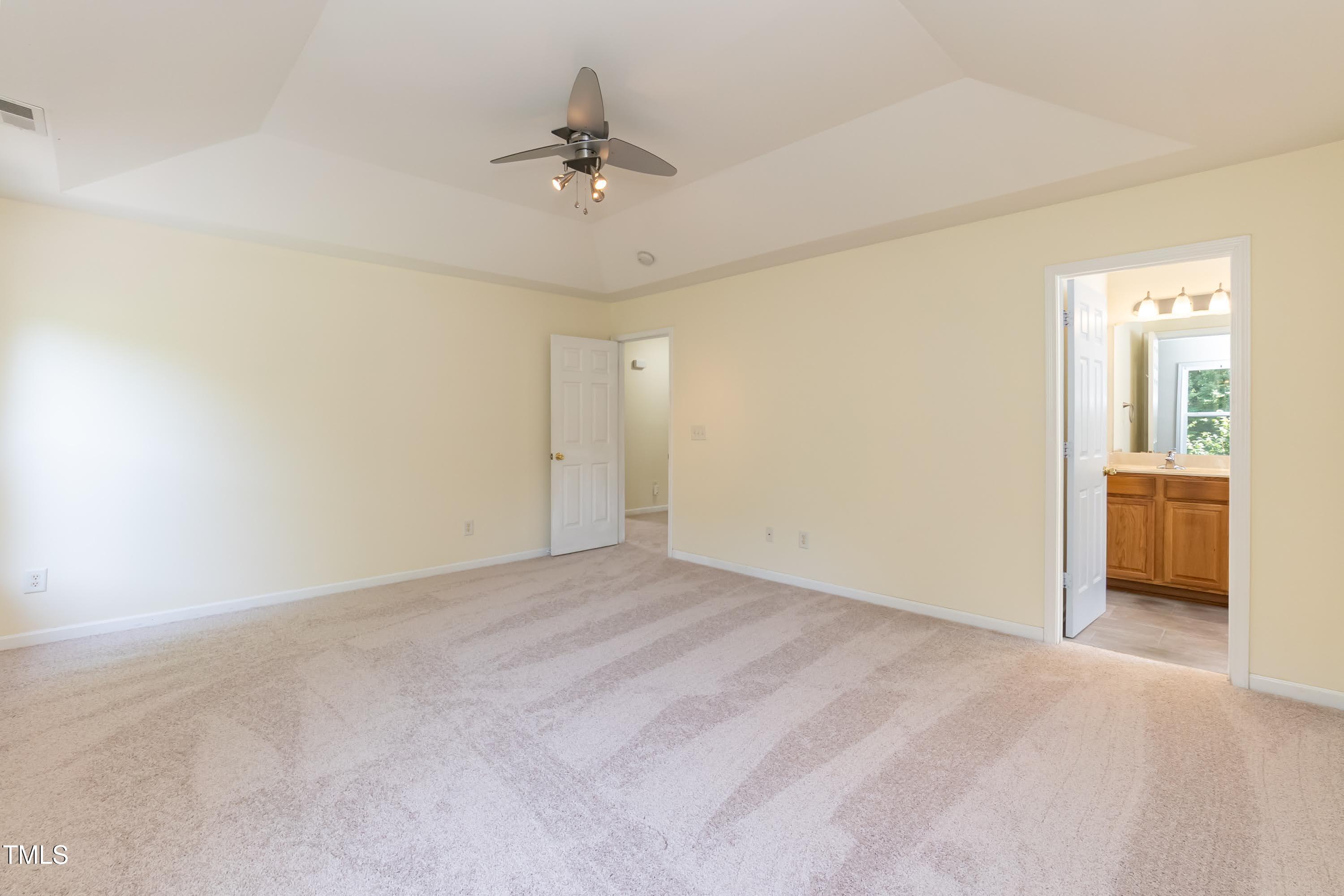 418 Byrams Ford Drive Cary, NC 27513 - Photo 24 of 53 a view of a livingroom with a chandelier fan