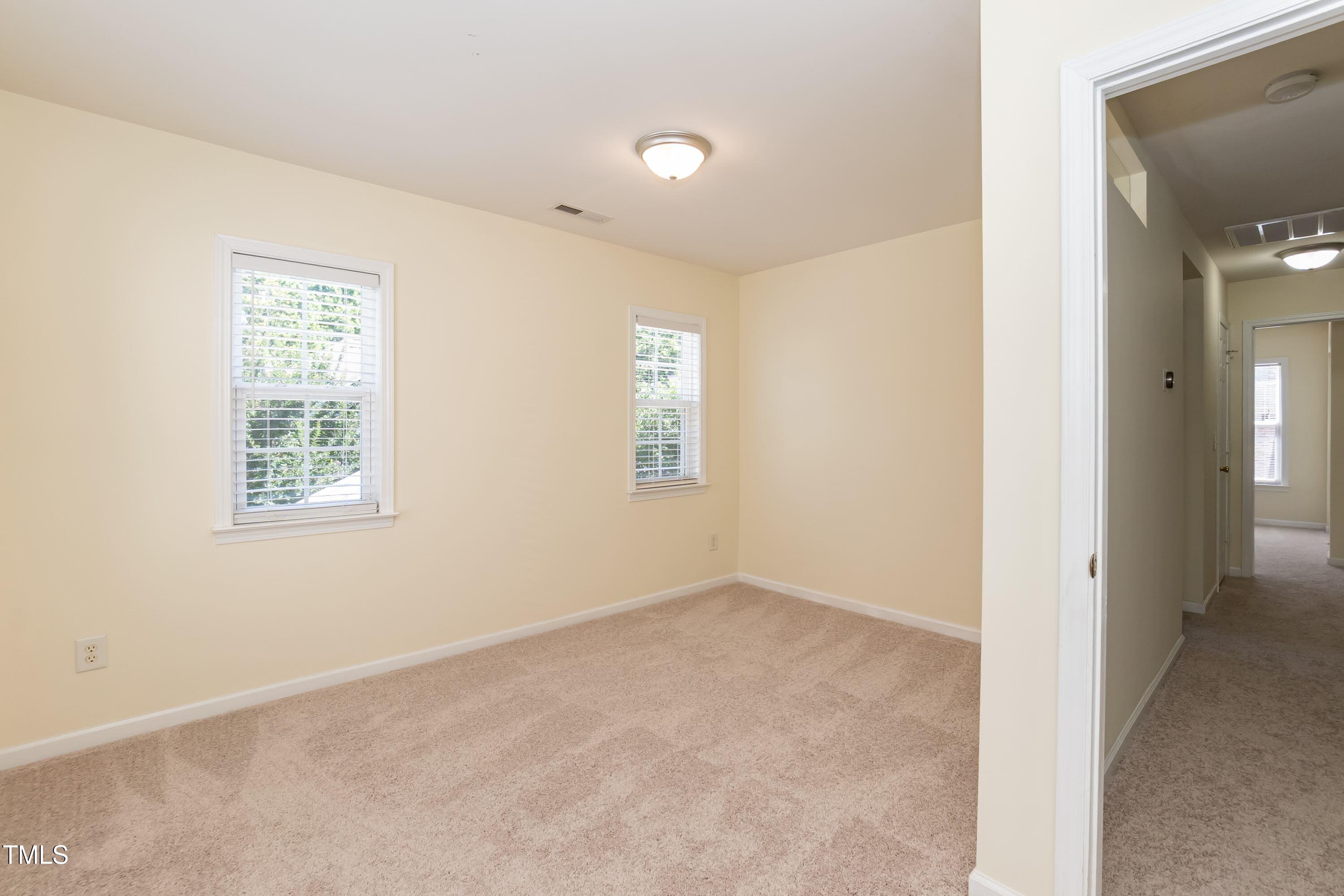 418 Byrams Ford Drive Cary, NC 27513 - Photo 29 of 53 an empty room with windows and closet