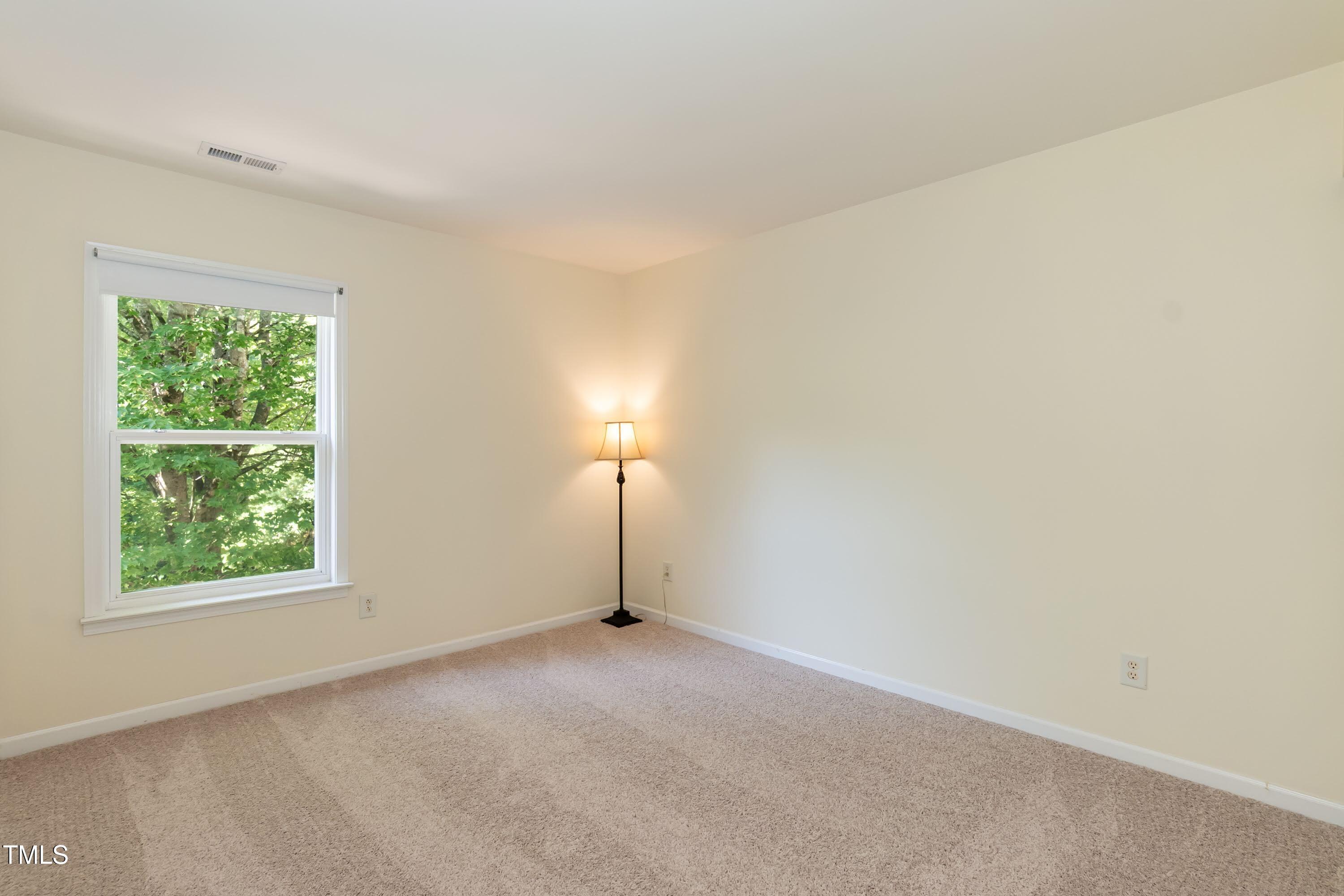 418 Byrams Ford Drive Cary, NC 27513 - Photo 30 of 53 an empty room with a window