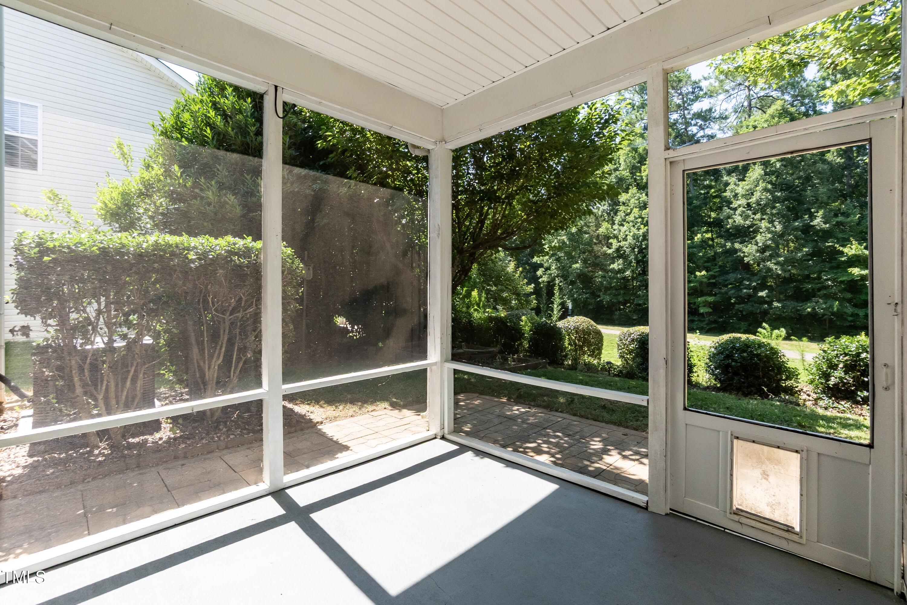 418 Byrams Ford Drive Cary, NC 27513 - Photo 33 of 53 a view of a glass door with a balcony