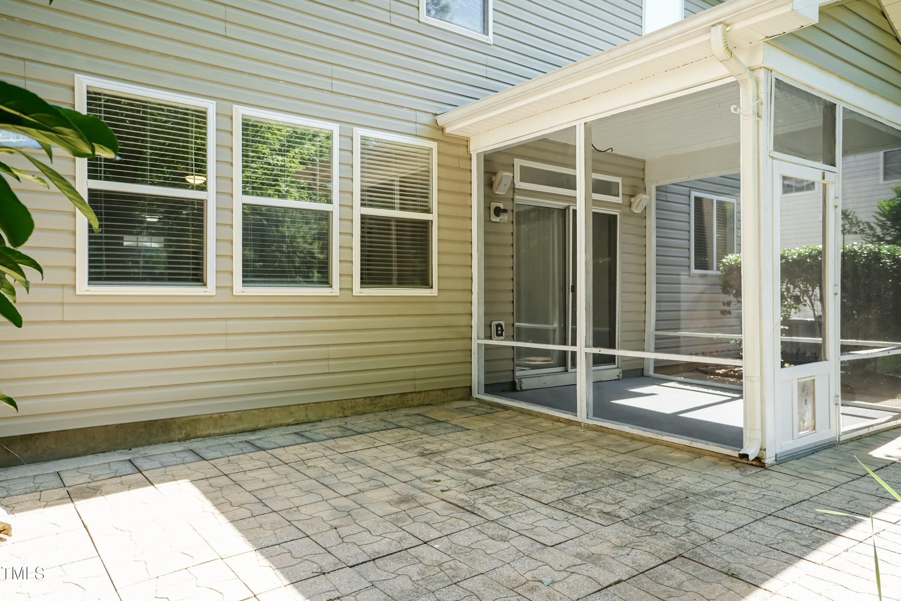 418 Byrams Ford Drive Cary, NC 27513 - Photo 36 of 53 a view of a backyard with a large window