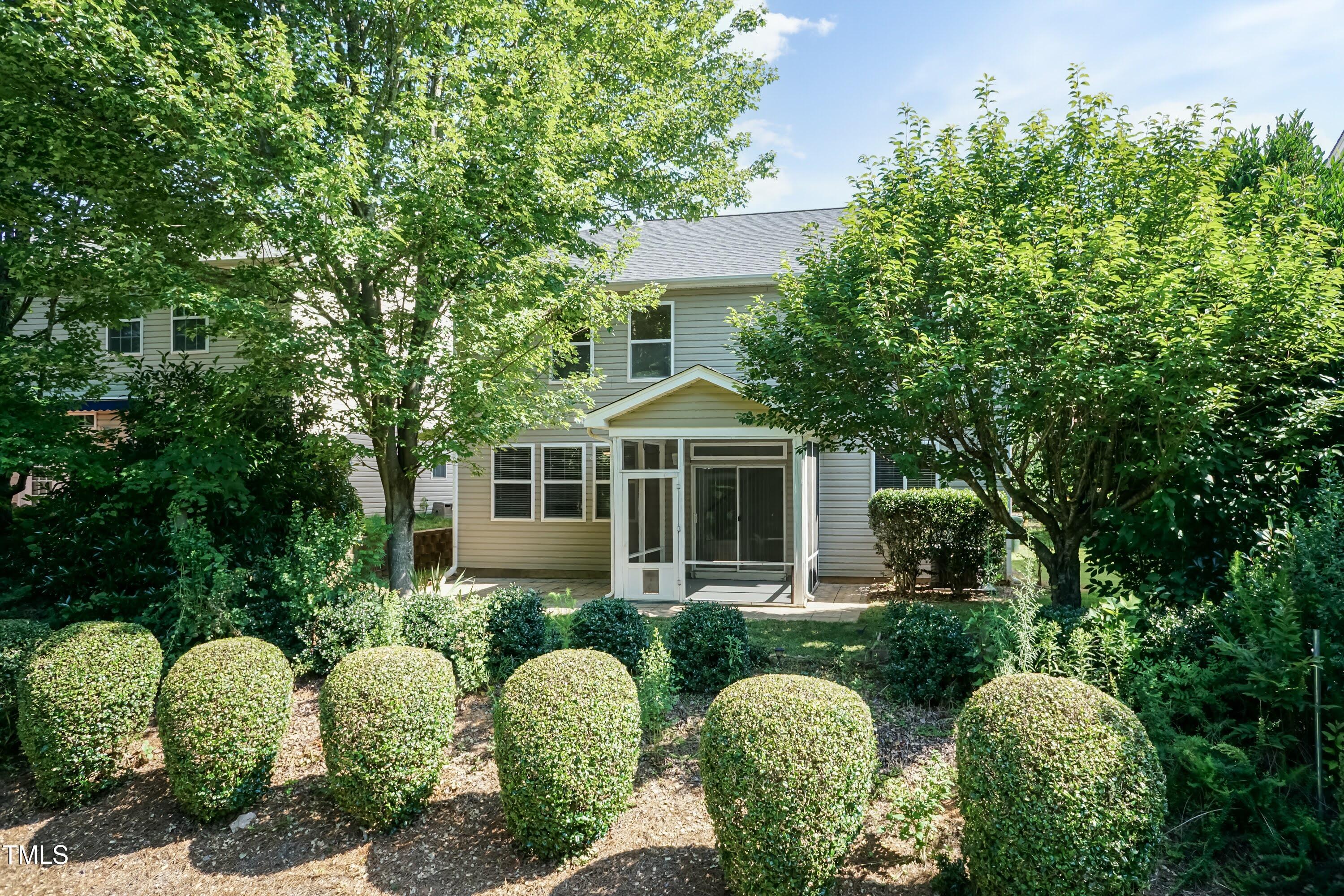 418 Byrams Ford Drive Cary, NC 27513 - Photo 40 of 53 a front view of house with yard and green space