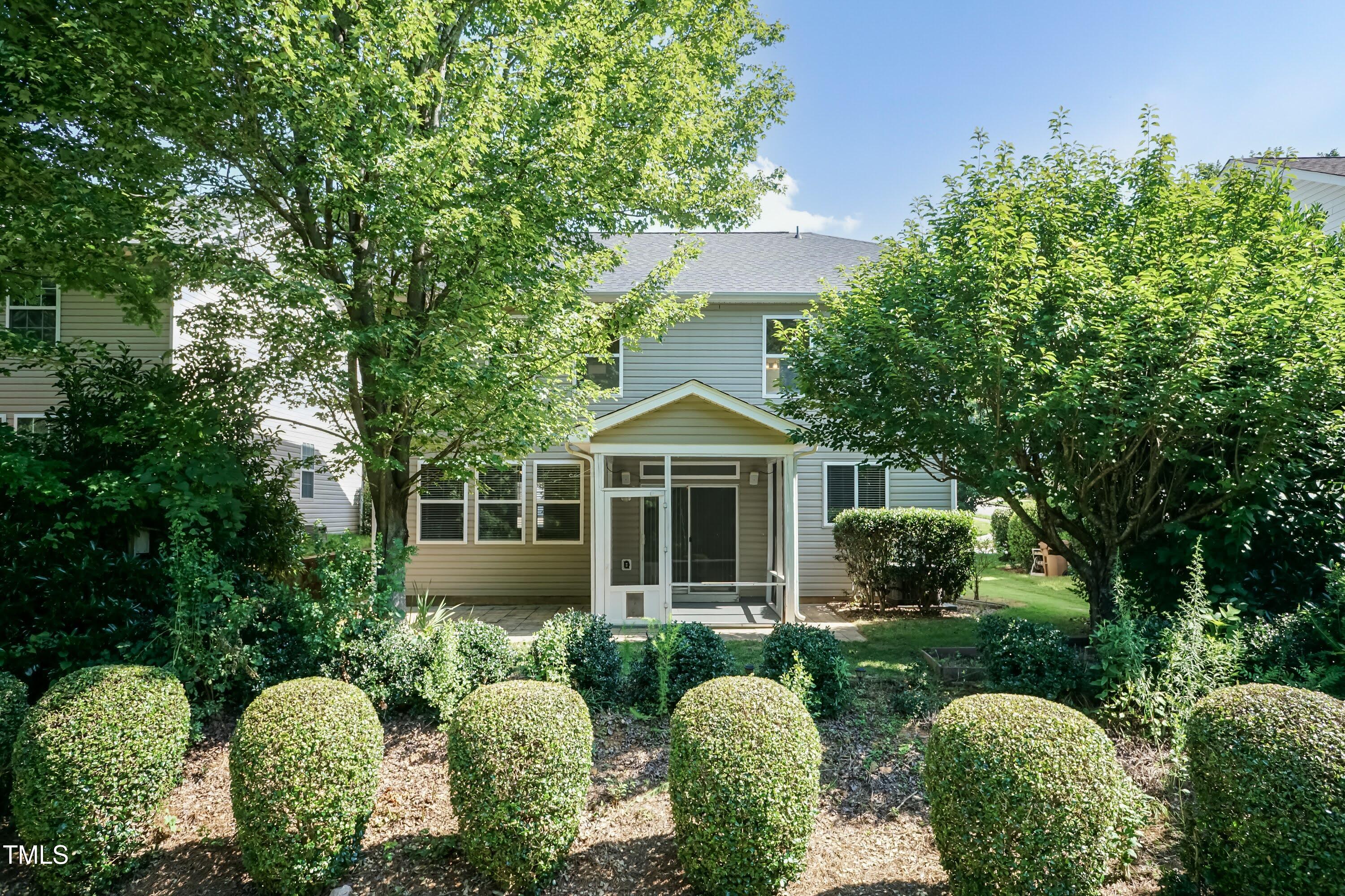 418 Byrams Ford Drive Cary, NC 27513 - Photo 41 of 53 a front view of a house with garden
