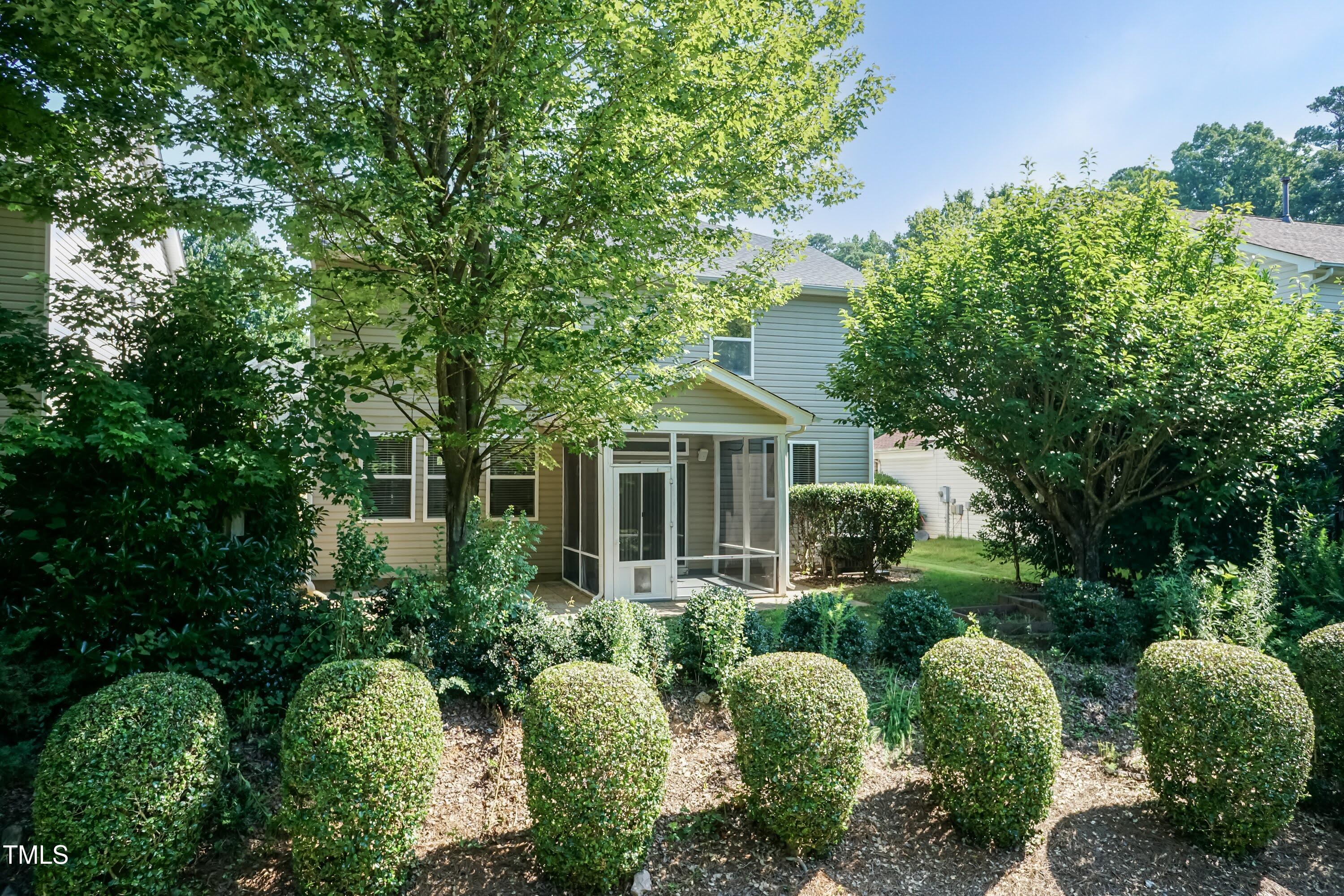 418 Byrams Ford Drive Cary, NC 27513 - Photo 42 of 53 a front view of house with yard and green space