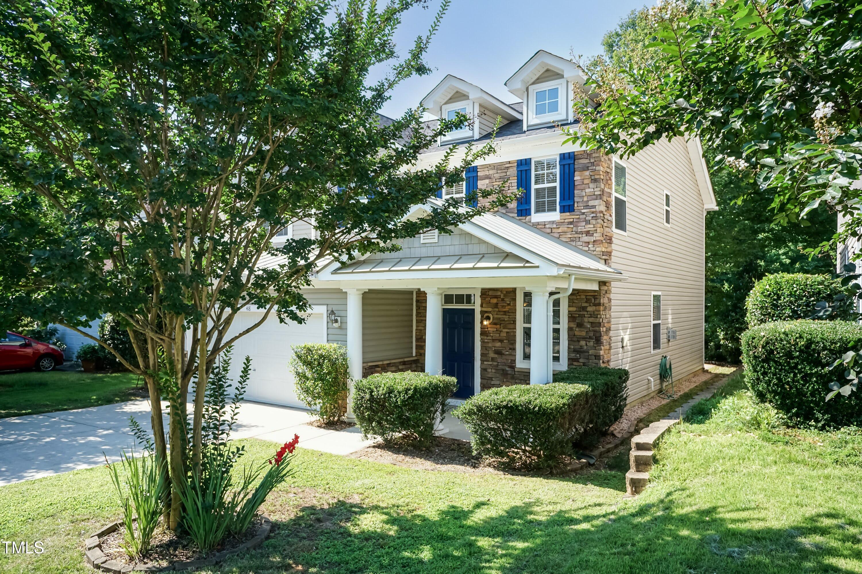 418 Byrams Ford Drive Cary, NC 27513 - Photo 44 of 53 a front view of a house with a yard