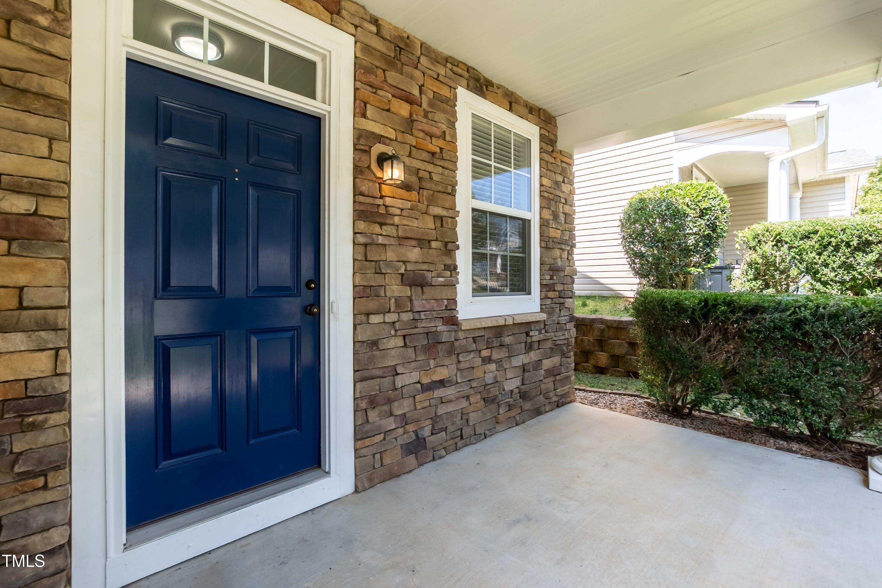 418 Byrams Ford Drive Cary, NC 27513 - Photo 4 of 53 a view of outdoor space and front door of house