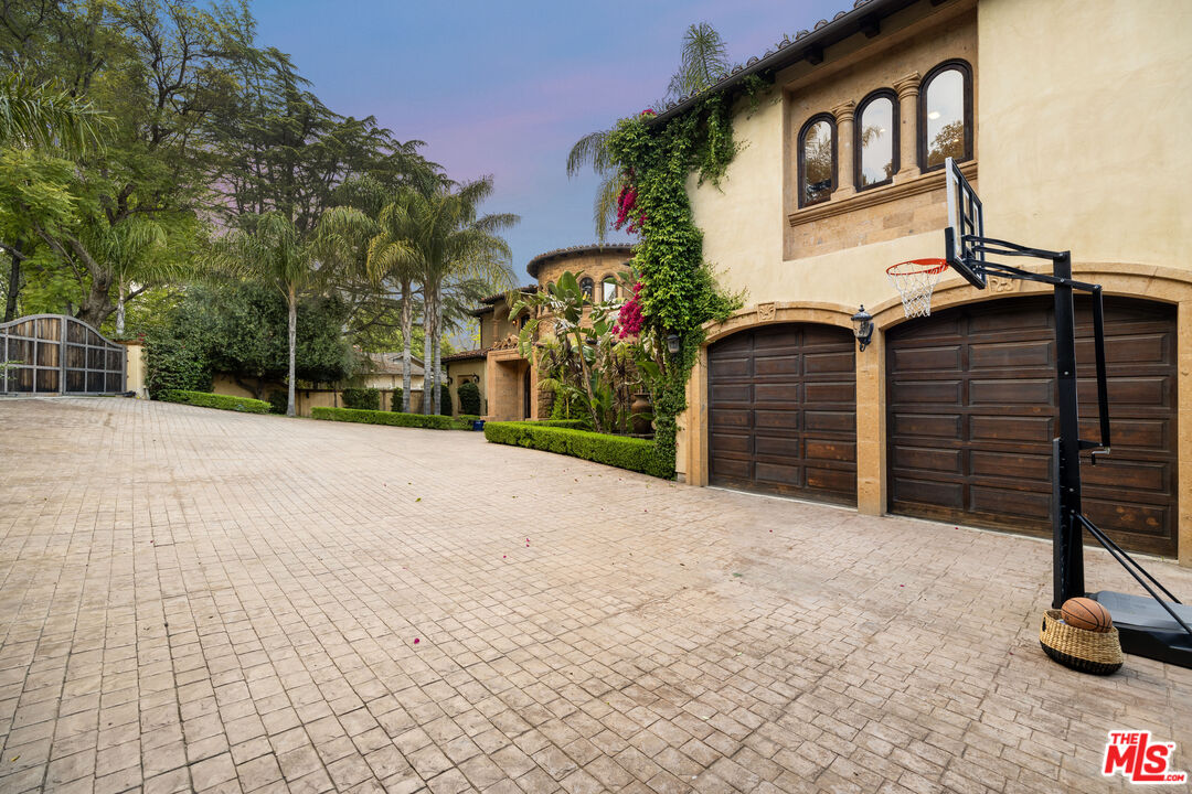 18607 Cassandra Street Tarzana, CA 91356 - Photo 12 of 58 a view of a house with a snow in the yard