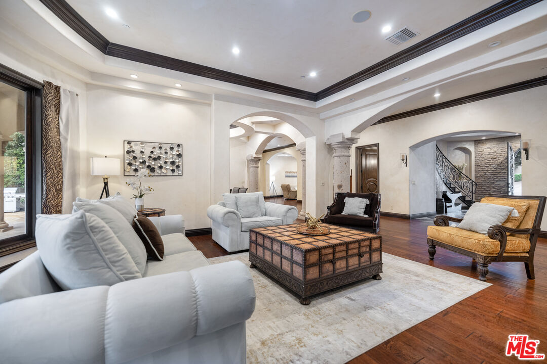 18607 Cassandra Street Tarzana, CA 91356 - Photo 15 of 58 a living room with furniture and a large window