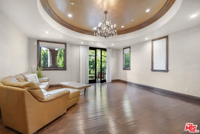 a bedroom with a bed and a fireplace