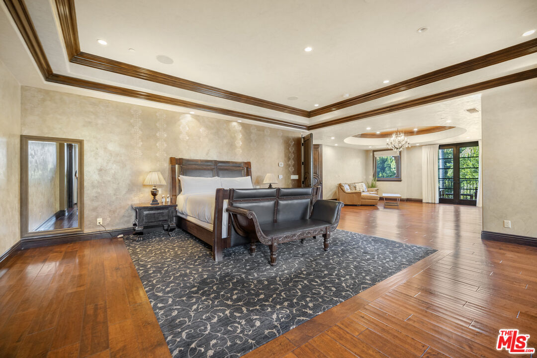 18607 Cassandra Street Tarzana, CA 91356 - Photo 24 of 58 a living room with a couch and wooden floor