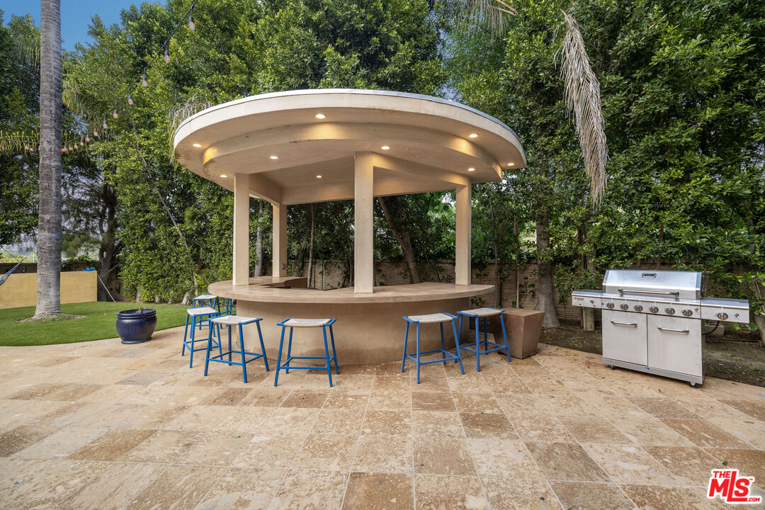 18607 Cassandra Street Tarzana, CA 91356 - Photo 49 of 58 a view of a sitting area with furniture and backyard