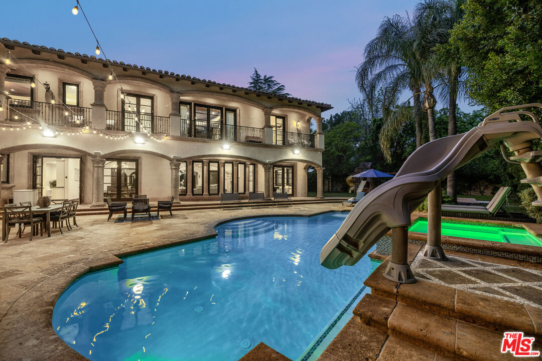 18607 Cassandra Street Tarzana, CA 91356 - Photo 8 of 58 a view of a house with swimming pool