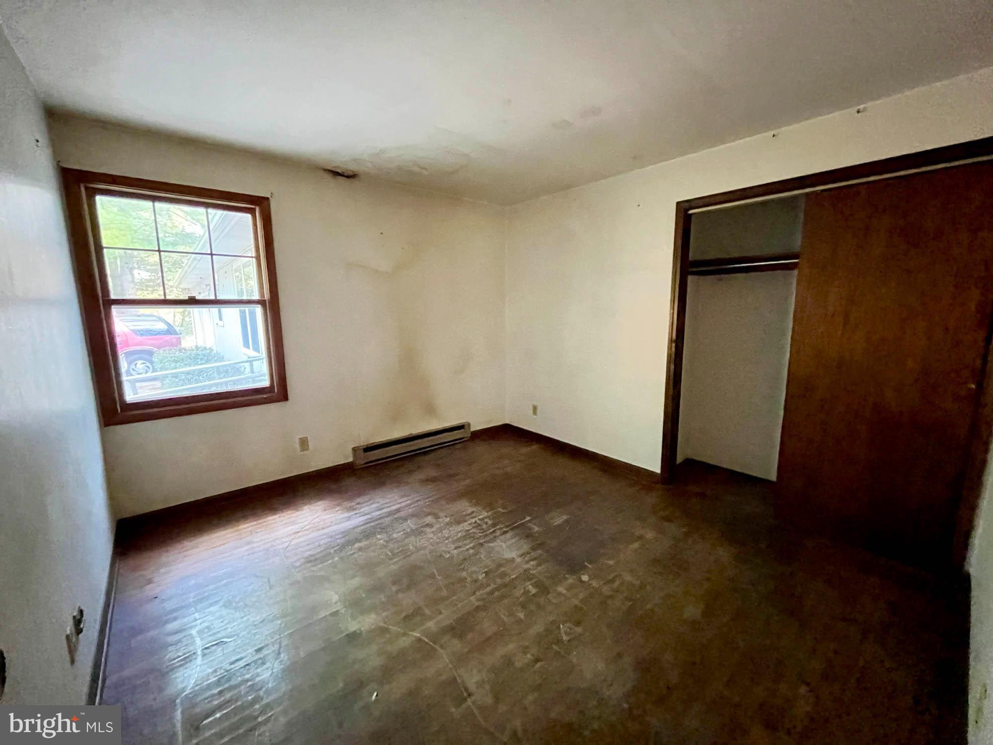 4992 Millers Station Road Hampstead, MD 21074 - Photo 13 of 24 an empty room with windows
