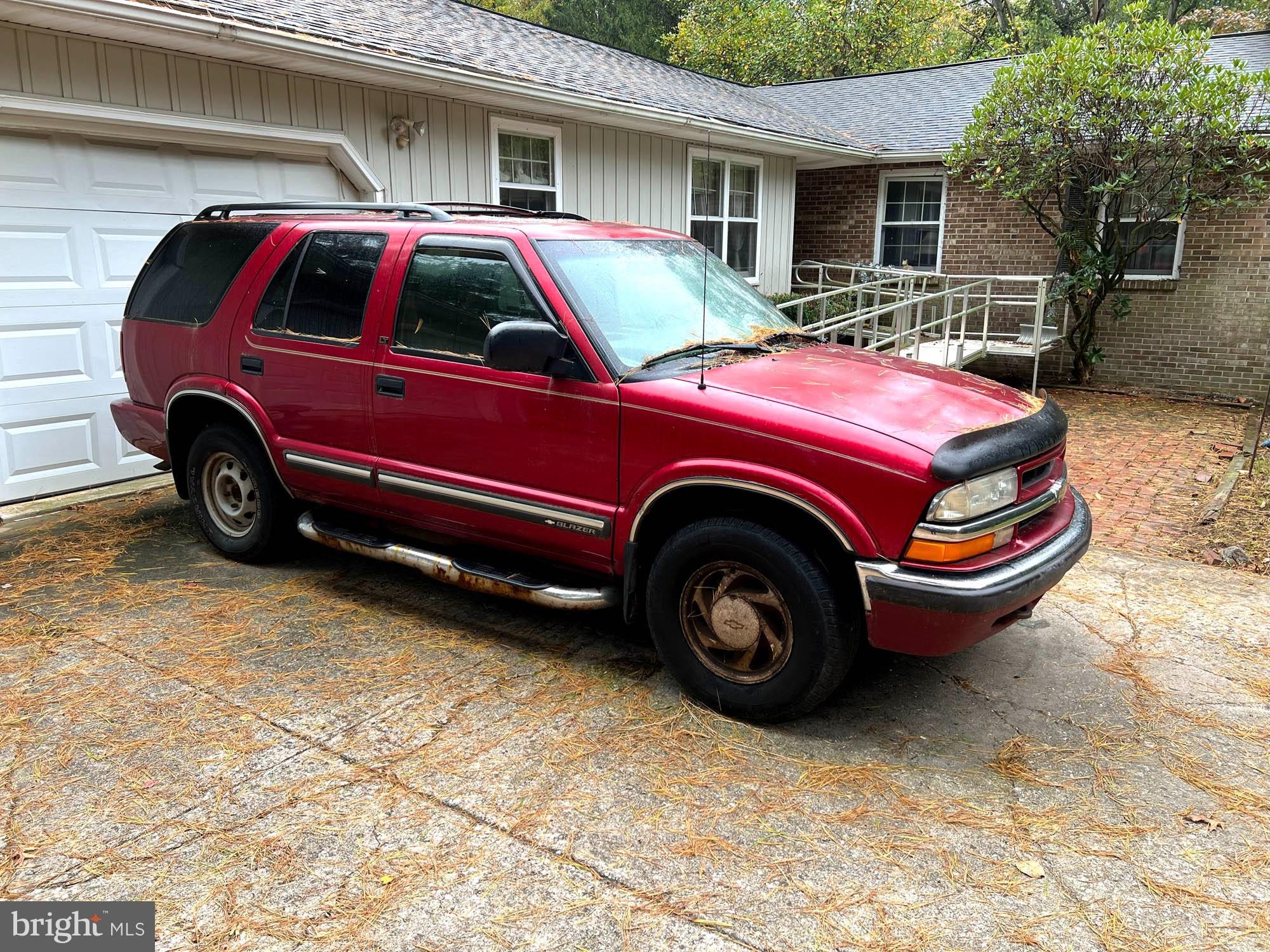 4992 Millers Station Road Hampstead, MD 21074 - Photo 22 of 24 a front view of a house with parking space