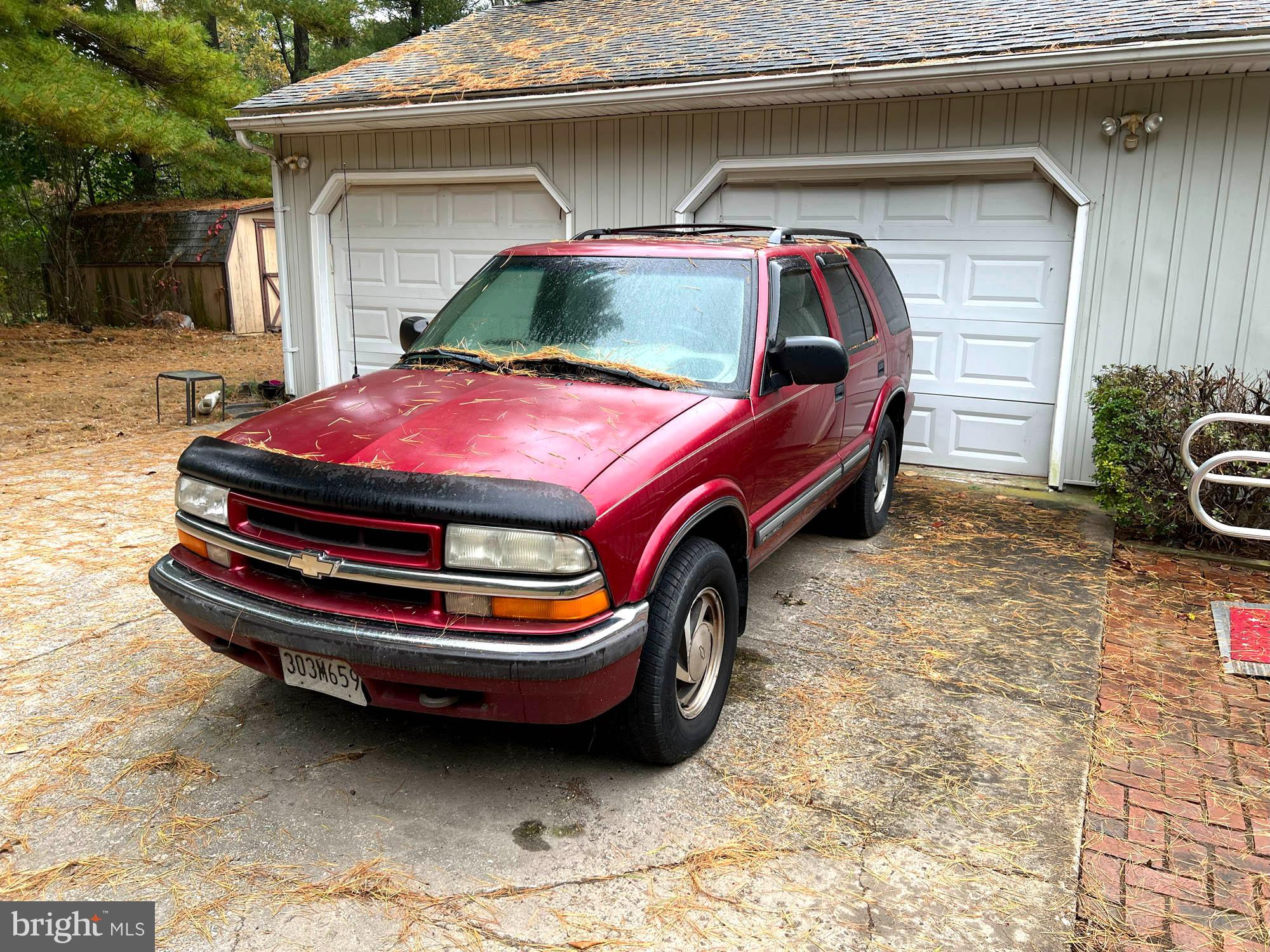 4992 Millers Station Road Hampstead, MD 21074 - Photo 23 of 24 a car parked in front of a house