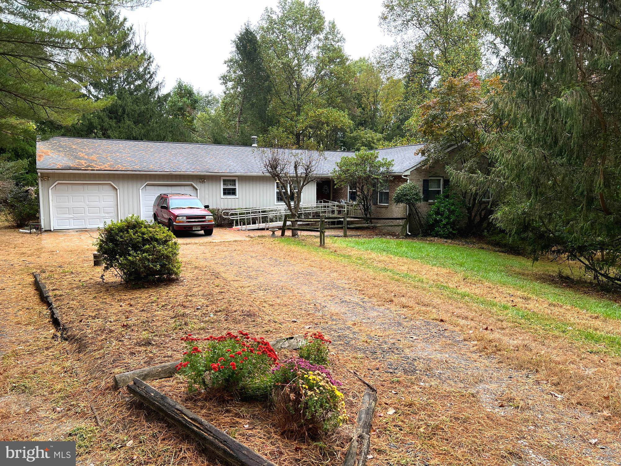 4992 Millers Station Road Hampstead, MD 21074 - Photo 3 of 24 a view of a house with backyard and sitting area