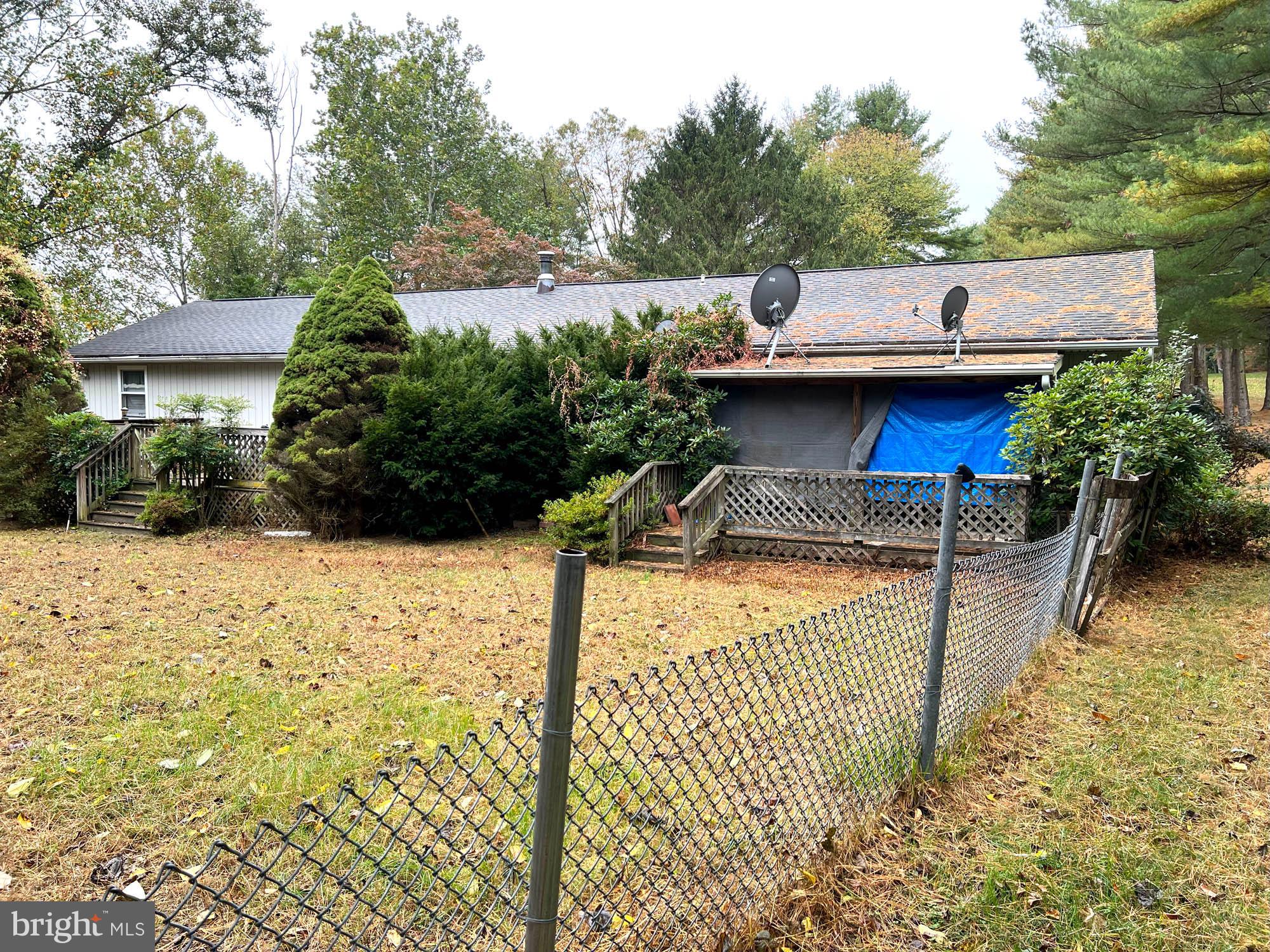 4992 Millers Station Road Hampstead, MD 21074 - Photo 4 of 24 a view of a swimming pool with a chair