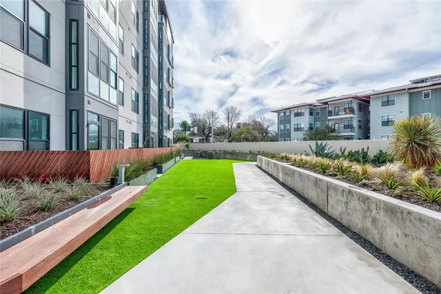 a view of swimming pool from a balcony