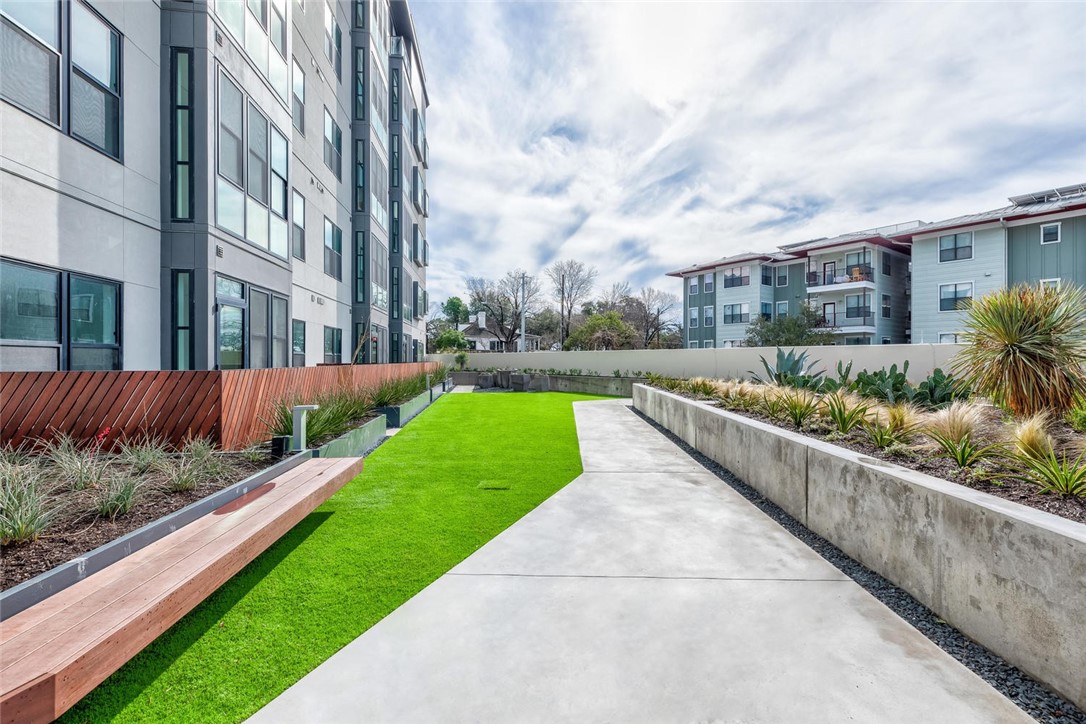 800 Embassy Drive, Unit 233 Austin, TX 78702 - Photo 31 of 40 a view of a garden with a pathway