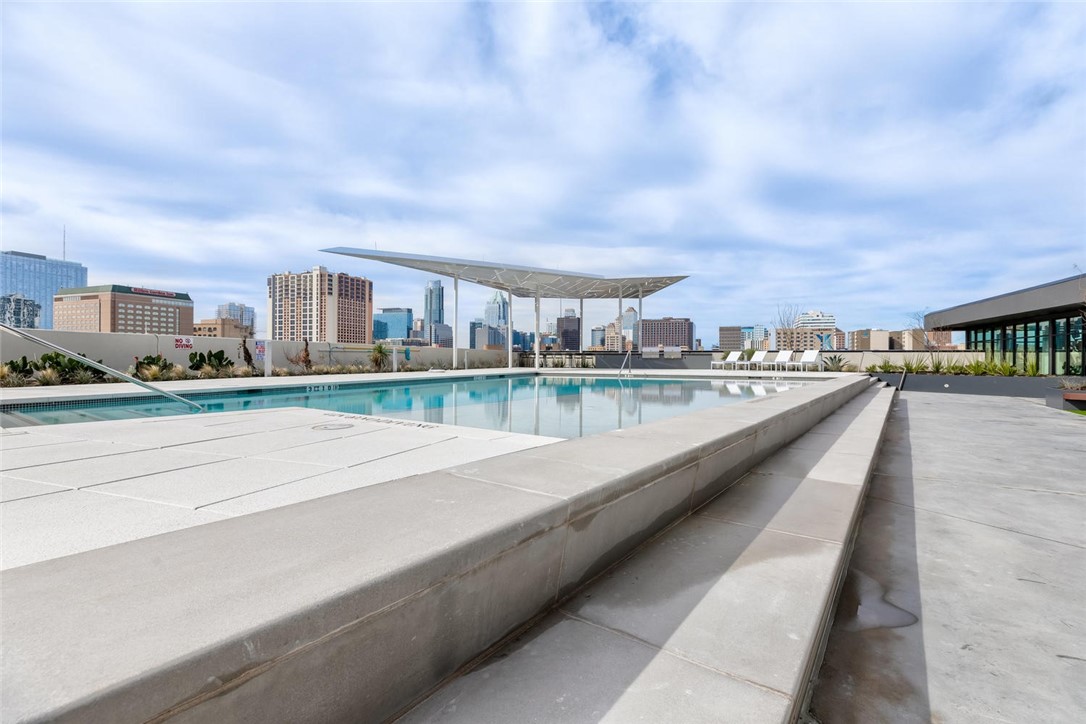 800 Embassy Drive, Unit 233 Austin, TX 78702 - Photo 34 of 40 a view of city and swimming pool