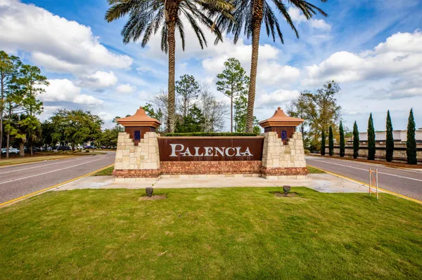 a view of a park with swings and slides