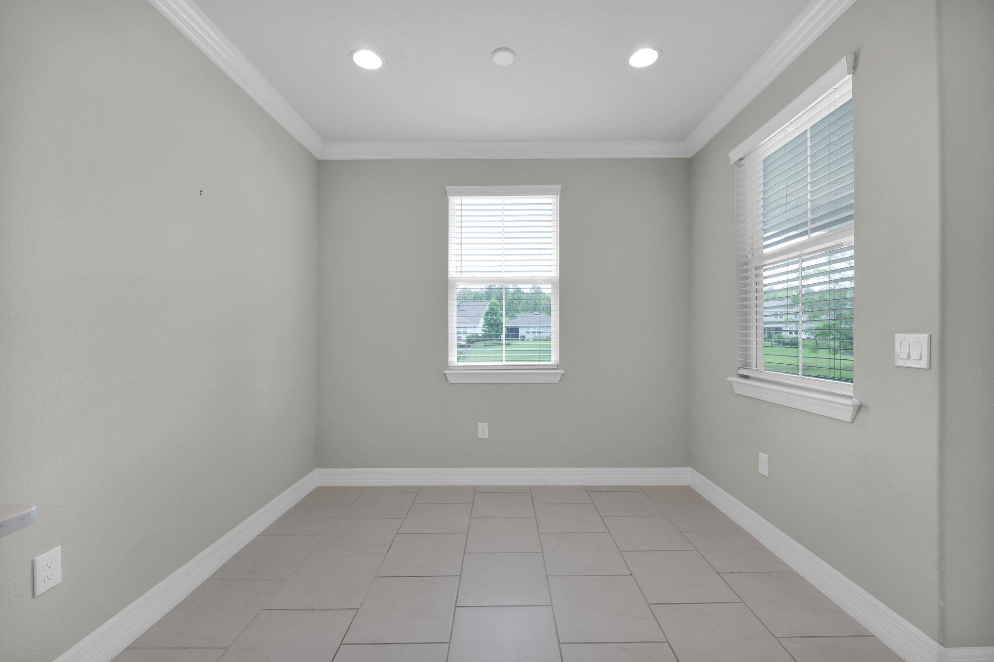 164 Front Door Lane St. Augustine, FL 32095 - Photo 19 of 42 a view of an empty room with a window
