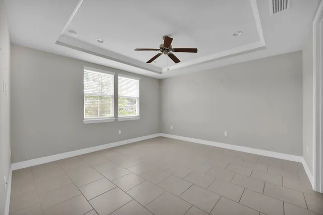 a bathroom with a double vanity sink a mirror and a shower