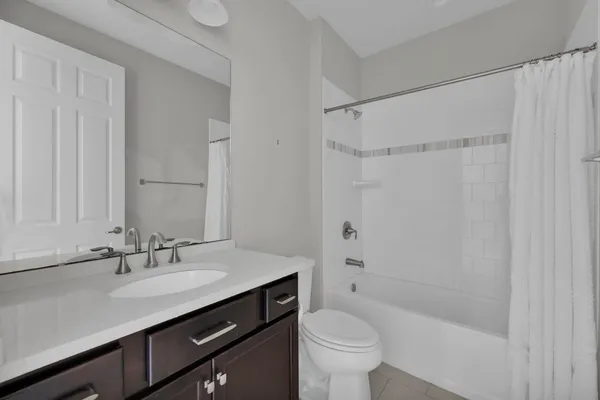 a view of an empty room with a balcony