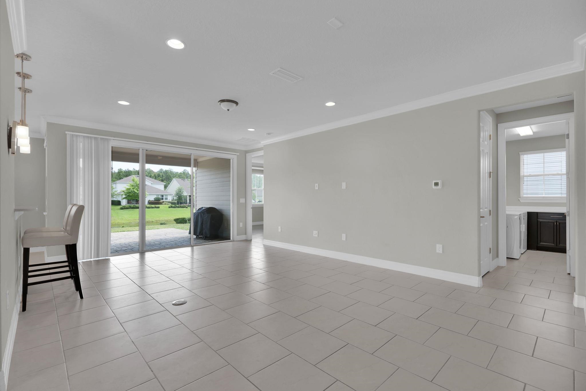 164 Front Door Lane St. Augustine, FL 32095 - Photo 27 of 42 a view of an empty room with a balcony