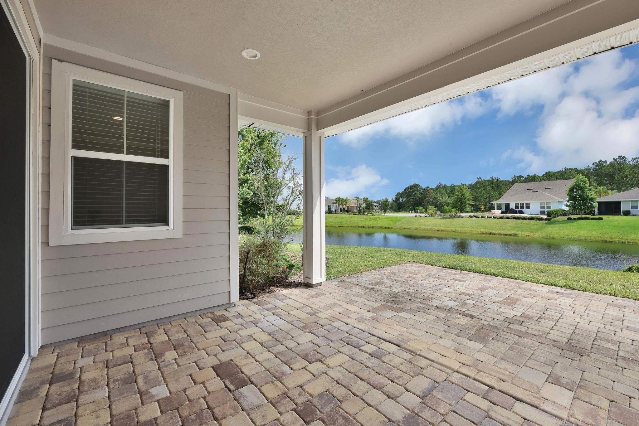 164 Front Door Lane St. Augustine, FL 32095 - Photo 28 of 42 a view of a house with a lake view